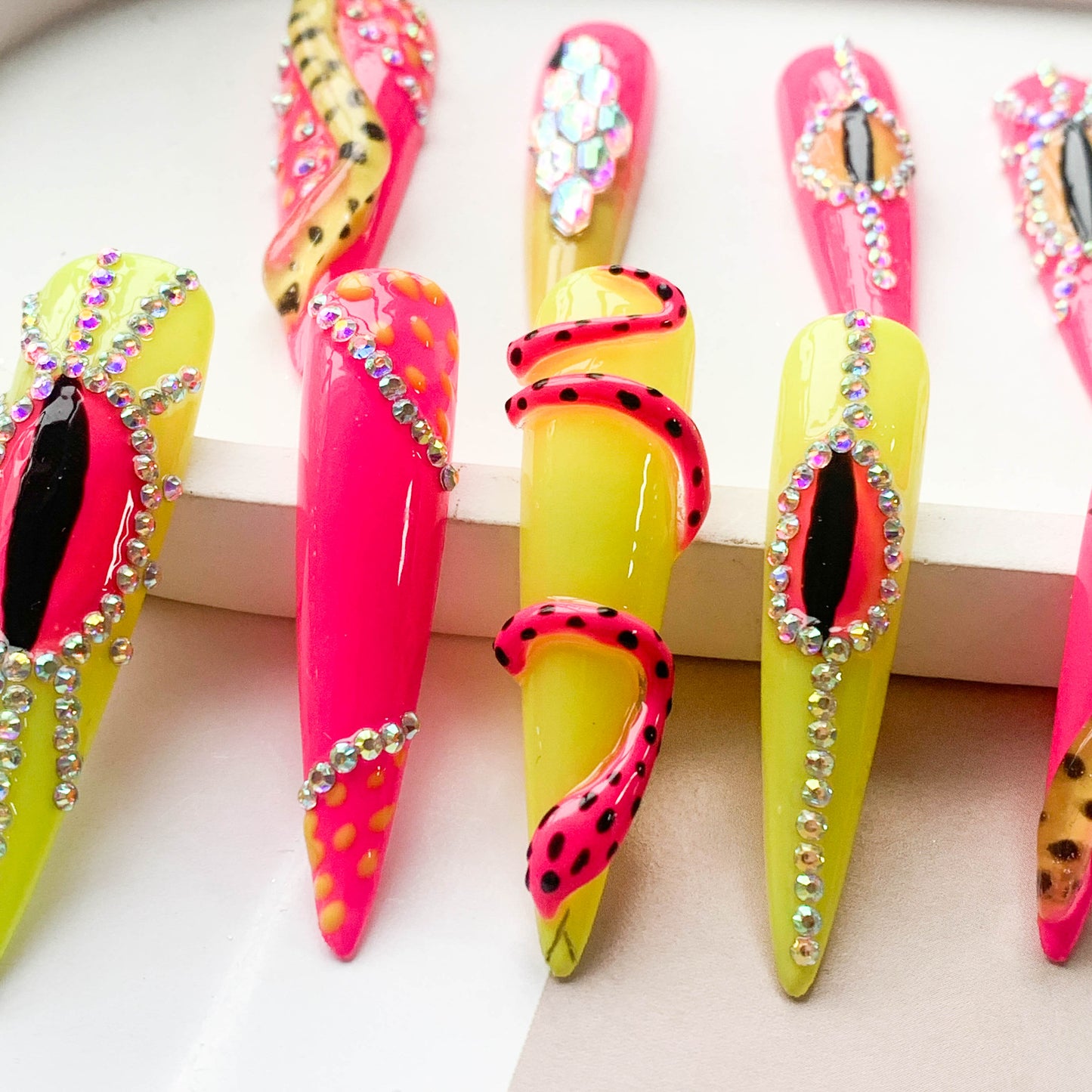 FC137 Long pointy pink snake polka dots